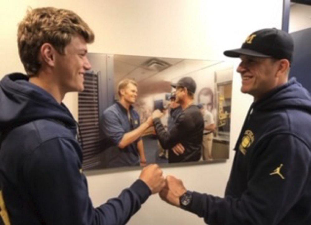 jj with harbaugh